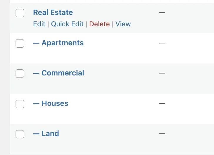 WordPress term list with the parent term Real Estate and its children Apartments, Commercial, Houses and Land, with Edit, Quick Edit, Delete and View links under Real Estate.
