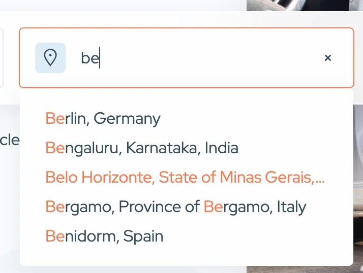 Address autocomplete field with "be" typed into it, showing five suggestions: Berlin, Germany; Bengaluru, Karnataka, India; Belo Horizonte, State of Minas Gerais; Bergamo, Province of Bergamo, Italy; and Benidorm, Spain.