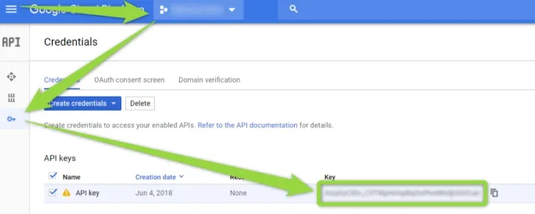 Google Cloud Credentials page with an API keys table containing a single key created Jun 4, 2018; green arrows point at the project selector in the top bar and at the key value, which is blurred out.
