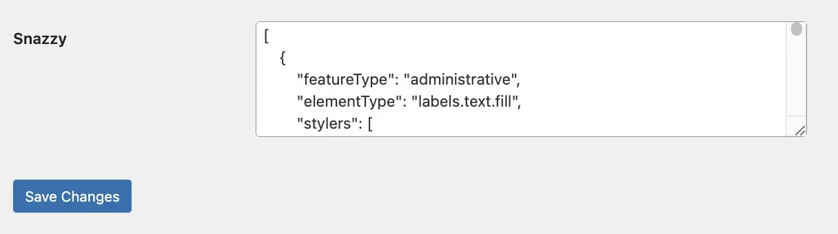 Settings row labelled Snazzy with a text area holding the pasted JSON style array, and a blue Save Changes button underneath.