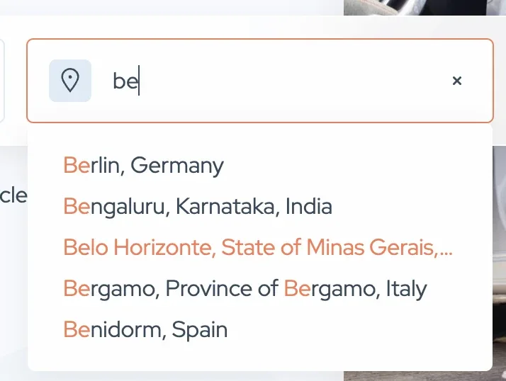 A location search box with "be" typed in, suggesting Berlin in Germany, Bengaluru in India, Belo Horizonte in Brazil, Bergamo in Italy and Benidorm in Spain.