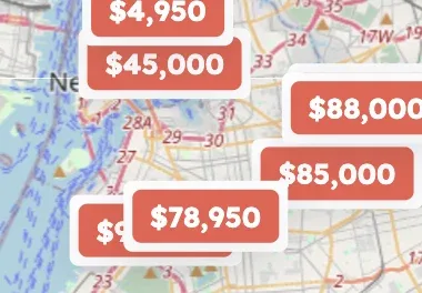 A close-up of a city map covered with red price tag markers reading $4,950, $45,000, $78,950, $85,000 and $88,000.