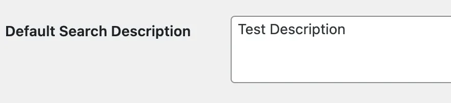 The Default Search Description setting, a multi-line field containing the text Test Description.