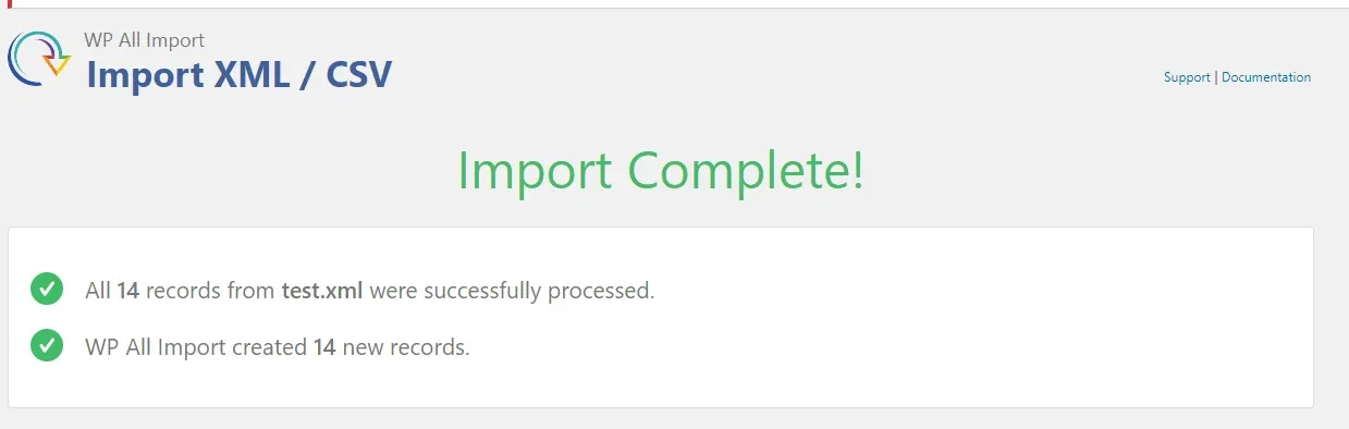 The Import Complete screen confirming that all 14 records from test.xml were processed and 14 new records created