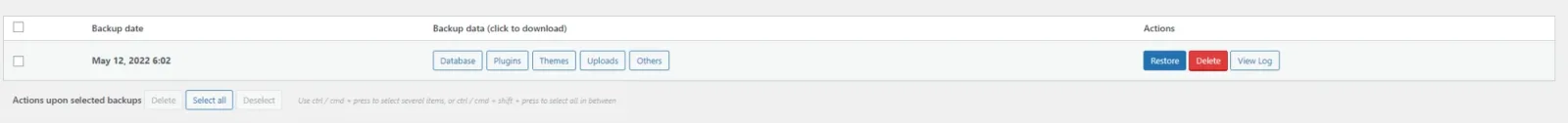 The Existing backups table with a single entry dated May 12, 2022, download buttons for Database, Plugins, Themes, Uploads and Others, and Restore, Delete and View Log actions.