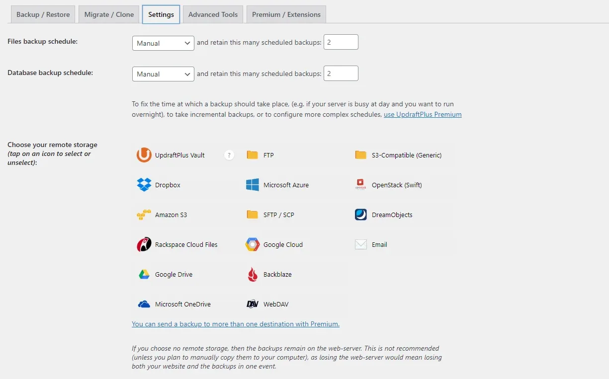 The UpdraftPlus Settings tab with the files and database backup schedules both set to Manual, retaining 2 backups, above a grid of remote storage options including Dropbox, Amazon S3, Google Drive, OneDrive and FTP.