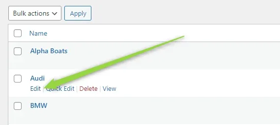 The Make term list showing Alpha Boats, Audi and BMW; a green arrow points at the Edit link in the row actions under Audi.