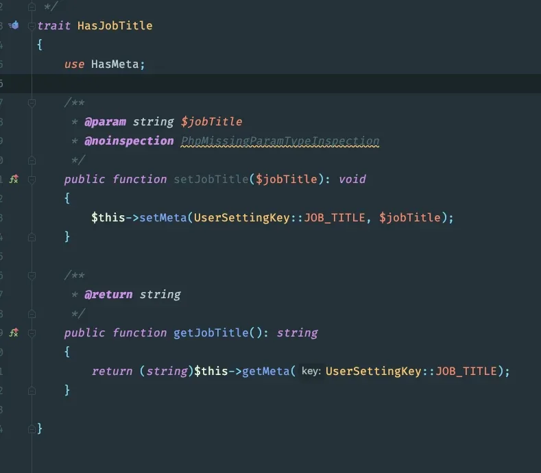 Source of the HasJobTitle trait: it uses HasMeta and defines setJobTitle(), which calls setMeta with UserSettingKey::JOB_TITLE, and getJobTitle(), which returns getMeta for the same key.