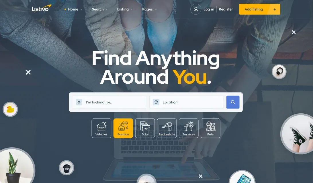 Darker homepage concept with the headline Find Anything Around You over a photo of people at a laptop, a search bar, category icons and product photos in circles around the edges